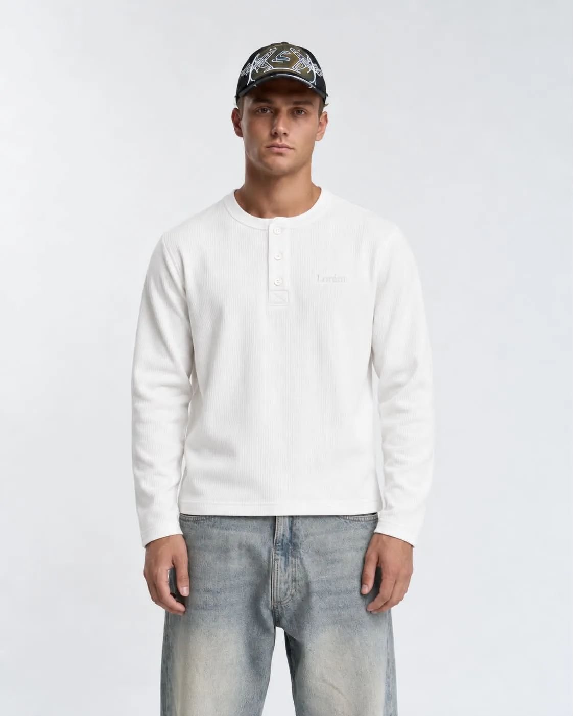 Male model wearing the white Matteo Henley, closer front view